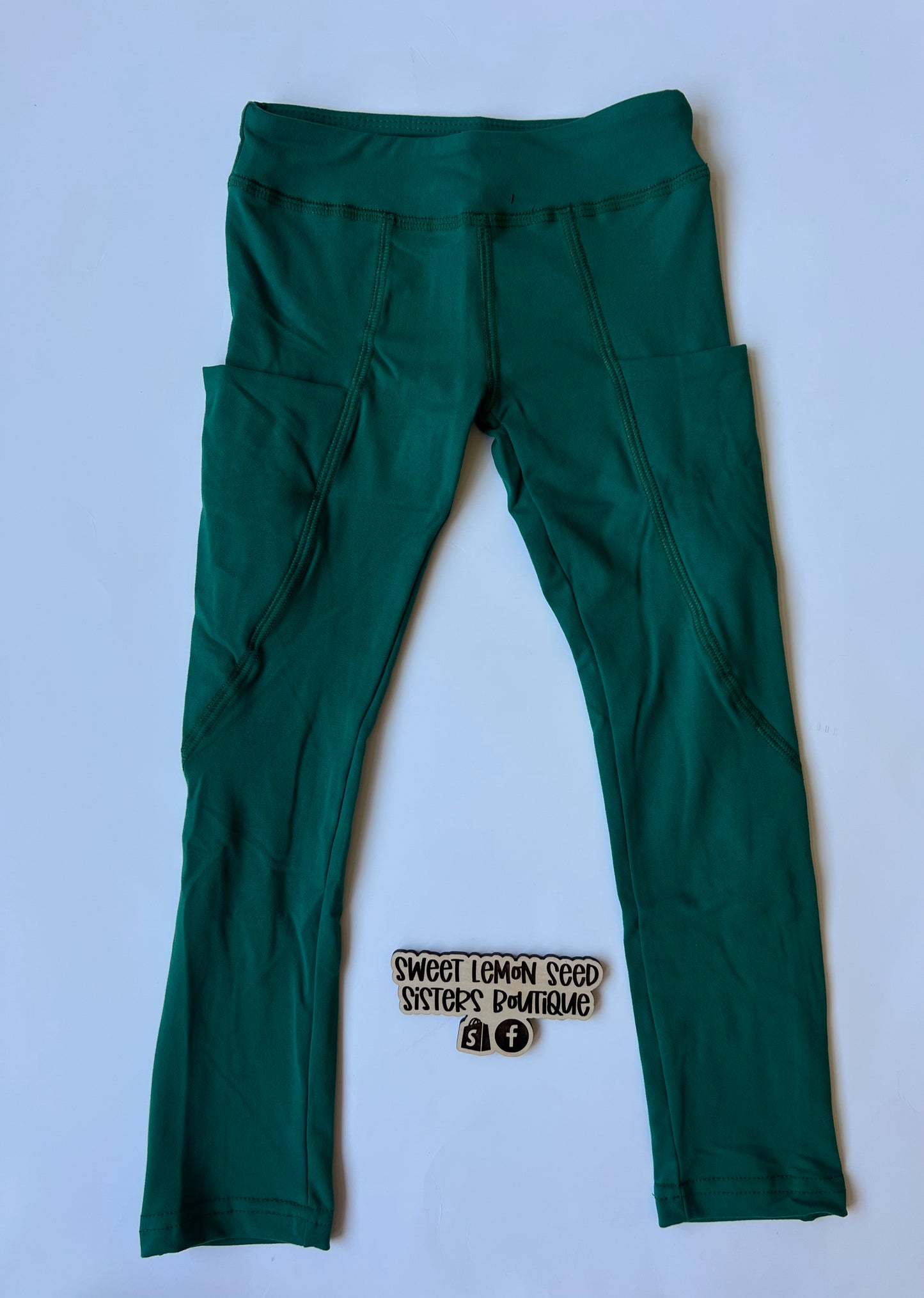 Dark green leggings (pockets or no pockets)